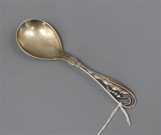 A 1930s Georg Jensen 925 sterling leaf and berry preserve spoon, no. 42, 15cm.
